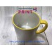 Cup with a yellow handle and a rim
