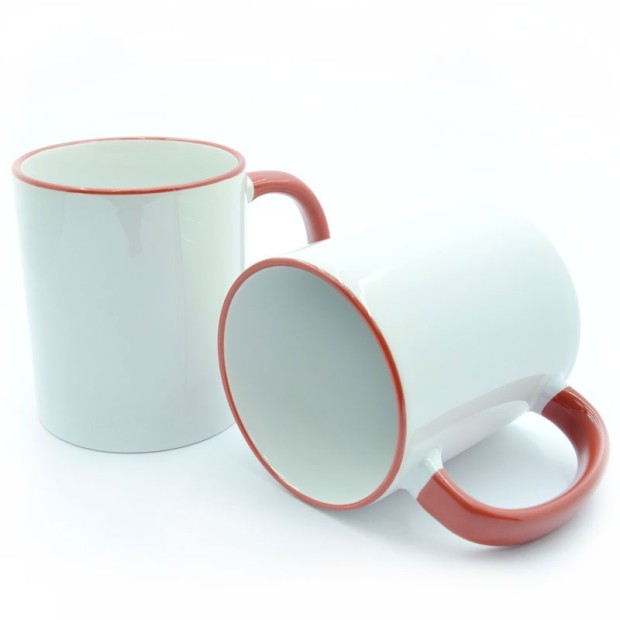 Cup with a red handle and a rim