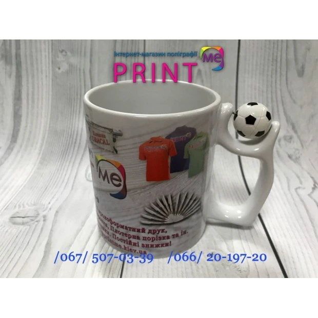 Cup with a soccer ball on the handle