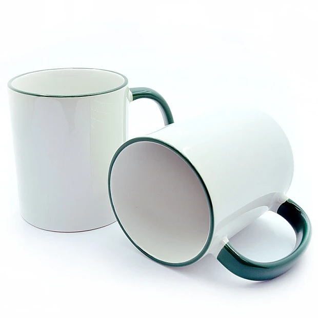 Cup with a dark green handle and a rim
